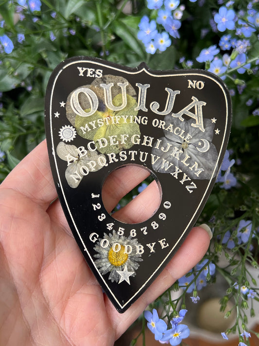 Quija Planchette mit Blumen